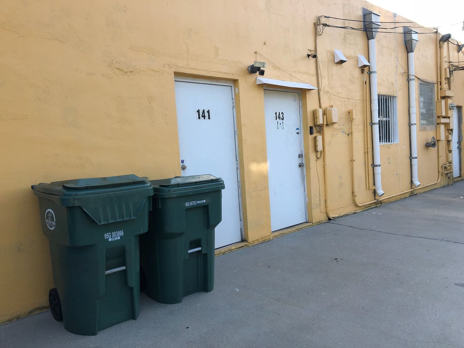 Exterior wall and doors of a commercial building — Finesse Cleaning, South Florida