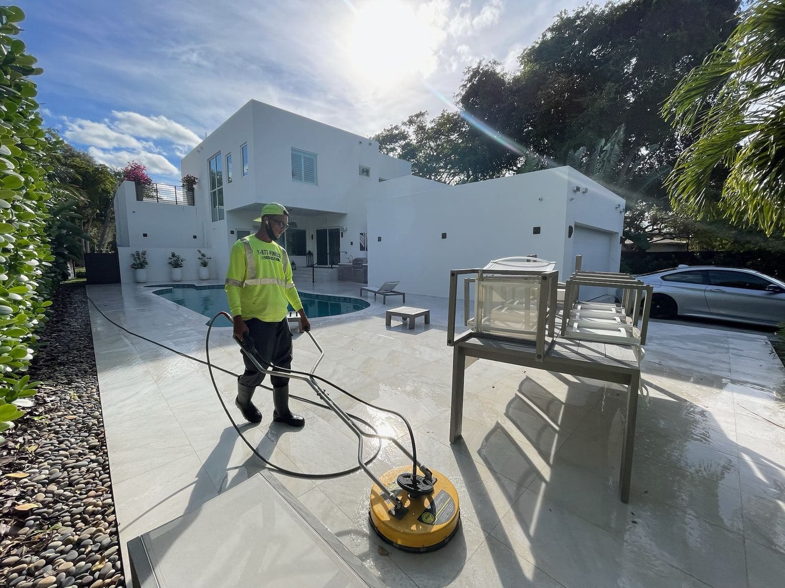 Crew cleaning a paver walkway — Finesse Cleaning, South Florida