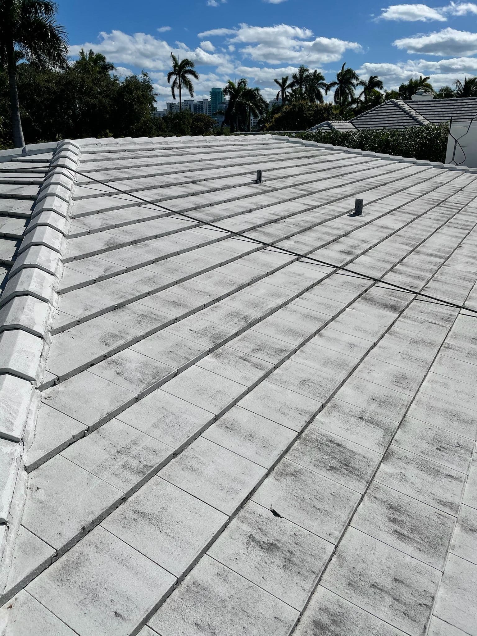 Flat roof after soft washing — Finesse Cleaning, South Florida