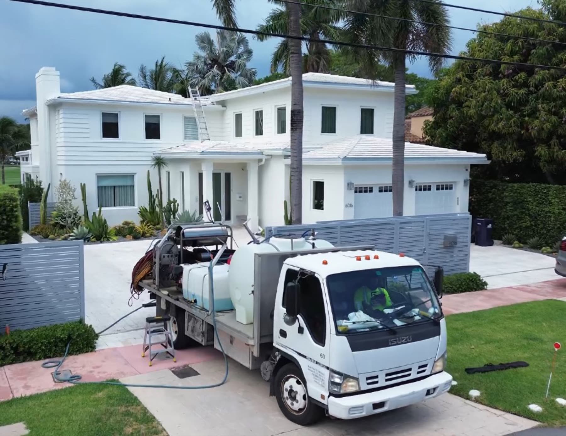 Finesse Cleaning truck on site at a South Florida home